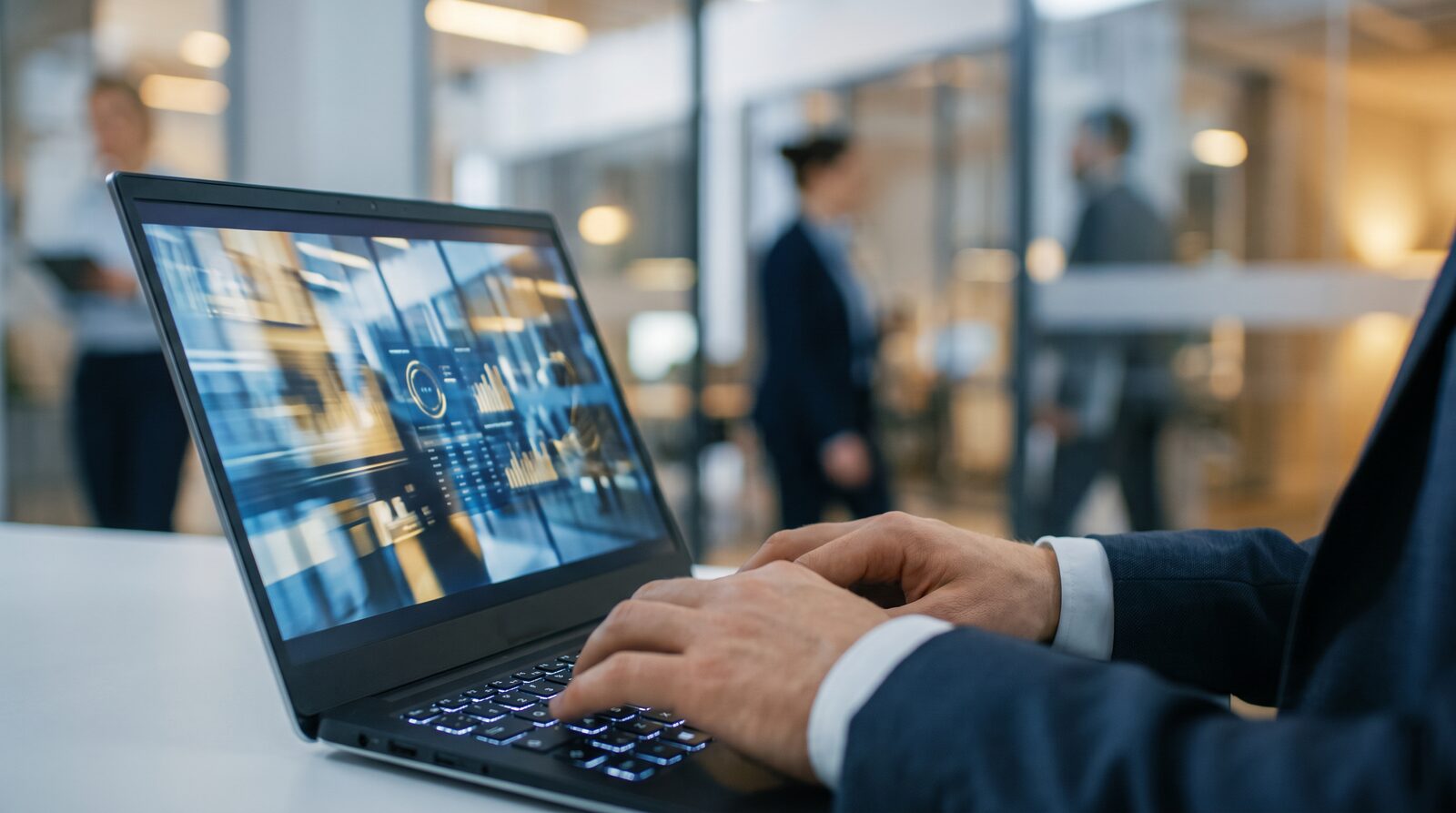 A business professional reviewing a video campaign dashboard in a modern office environment